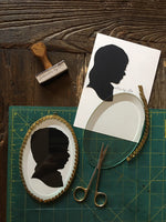 Oval Framed Custom Hand Cut Silhouette Art  -  Beveled Glass framed Silhouette Keepsake
